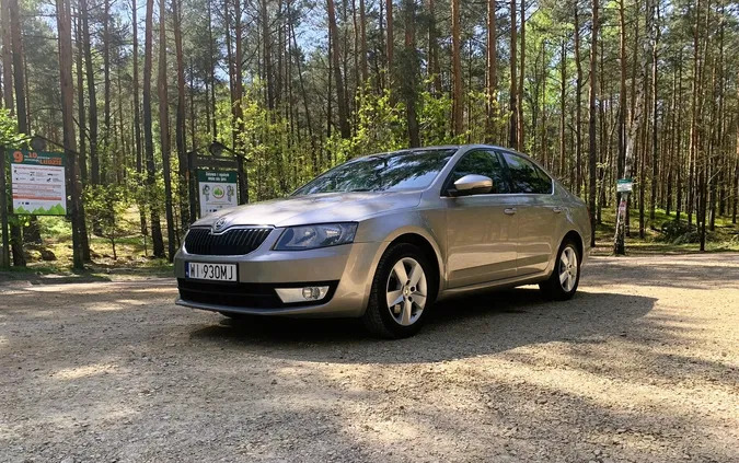 mazowieckie Skoda Octavia cena 29600 przebieg: 209000, rok produkcji 2013 z Strzyżów